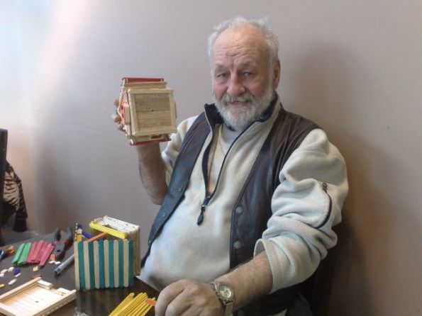 leo-making-popsicle-sticks-swiss-chalet-lodges1