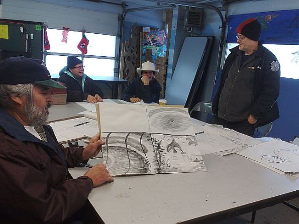 dave-maclean-looking-on-wiith-bob-showing-his-drawings