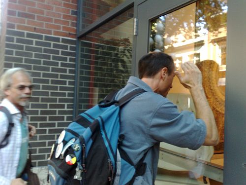 Hendrik and J-Hock peer into furniture store on Gastown