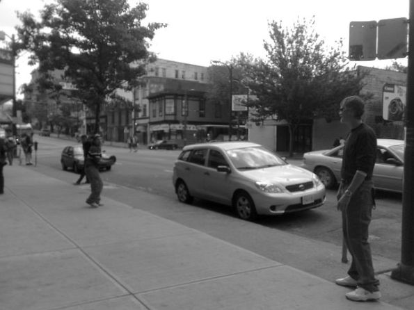 Ken playing football on the street 1 645 Ken playing football on the street 1 645