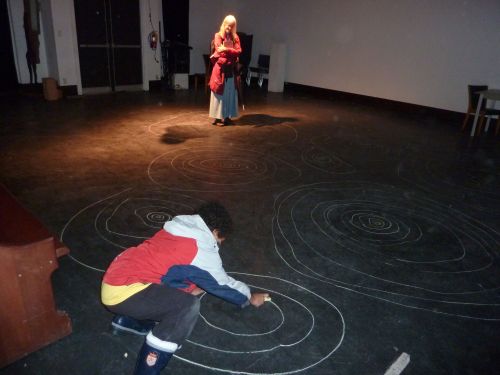 Savanah Walling watching young artist create