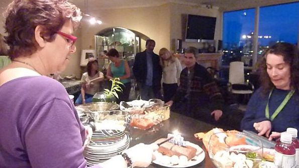 6 Randi lighting the candle for A.J. Birthday Cake