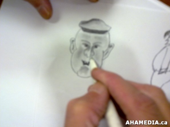 7 AHA MEDIA learns cartooning from Ian Savage, Artist in Vancouver