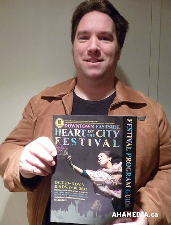 Peter of AHA MEDIA holding DTES Heart of the City Festival Guide 2013 1