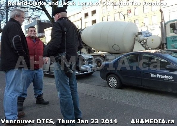 1 AHA MEDIA sees Roland Clarke and Jacek Lorek of DNC get photos taken by Province Newspaper